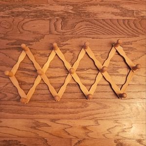 Vintage wood boho mcm accordion peg hanger